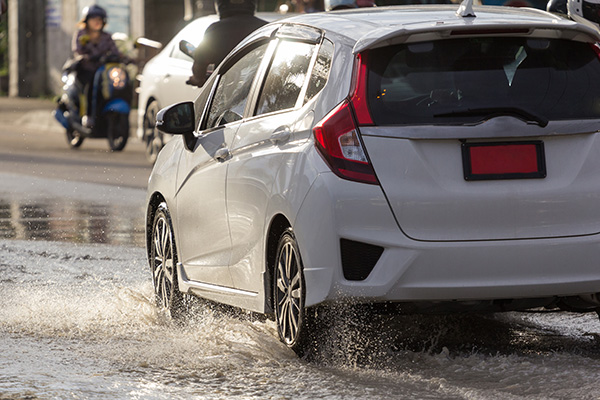 How Does Low Tire Tread Affect Braking on Wet Roads?